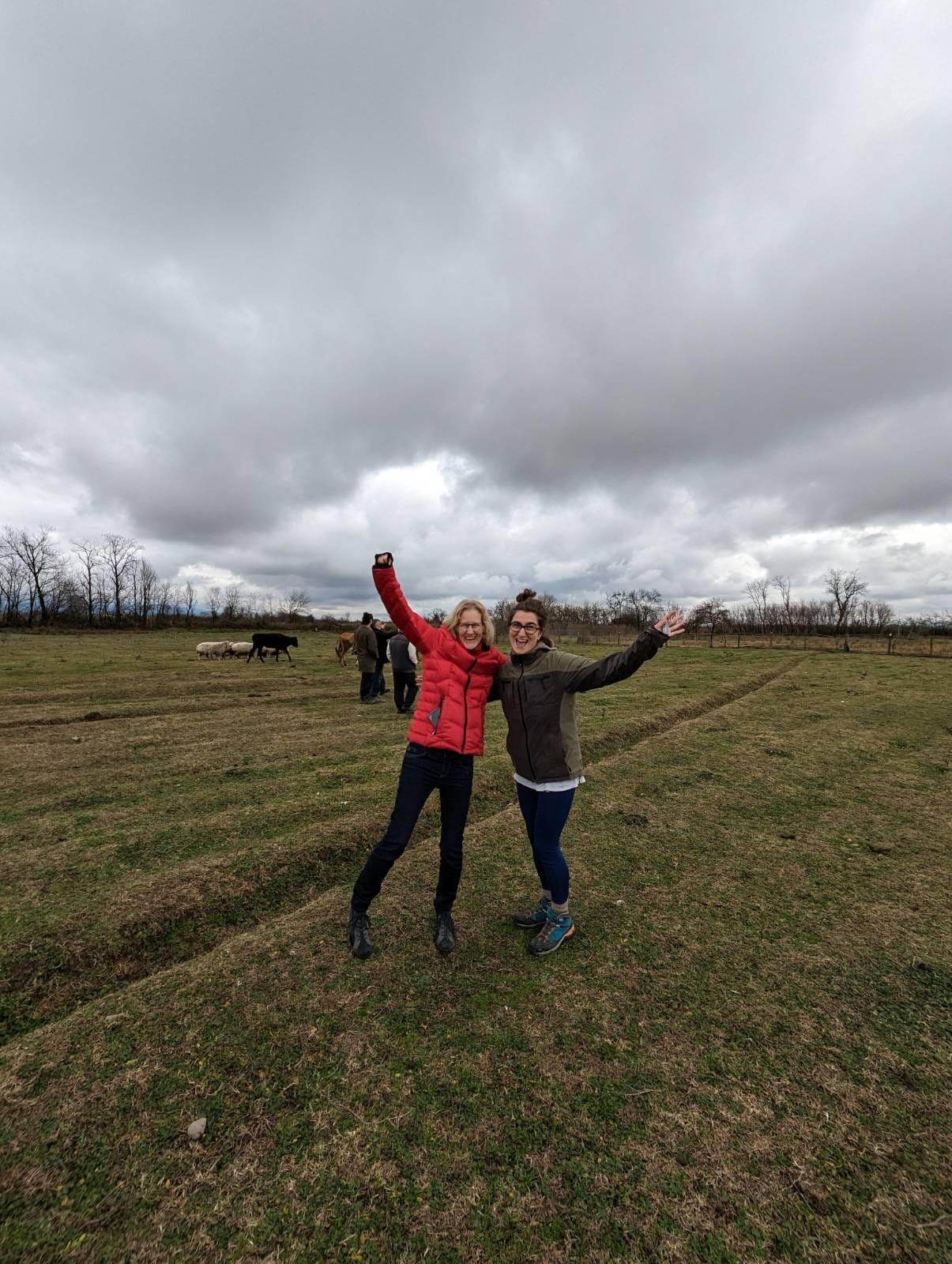 Anna samwel celebrating the plot of land she bought with another person