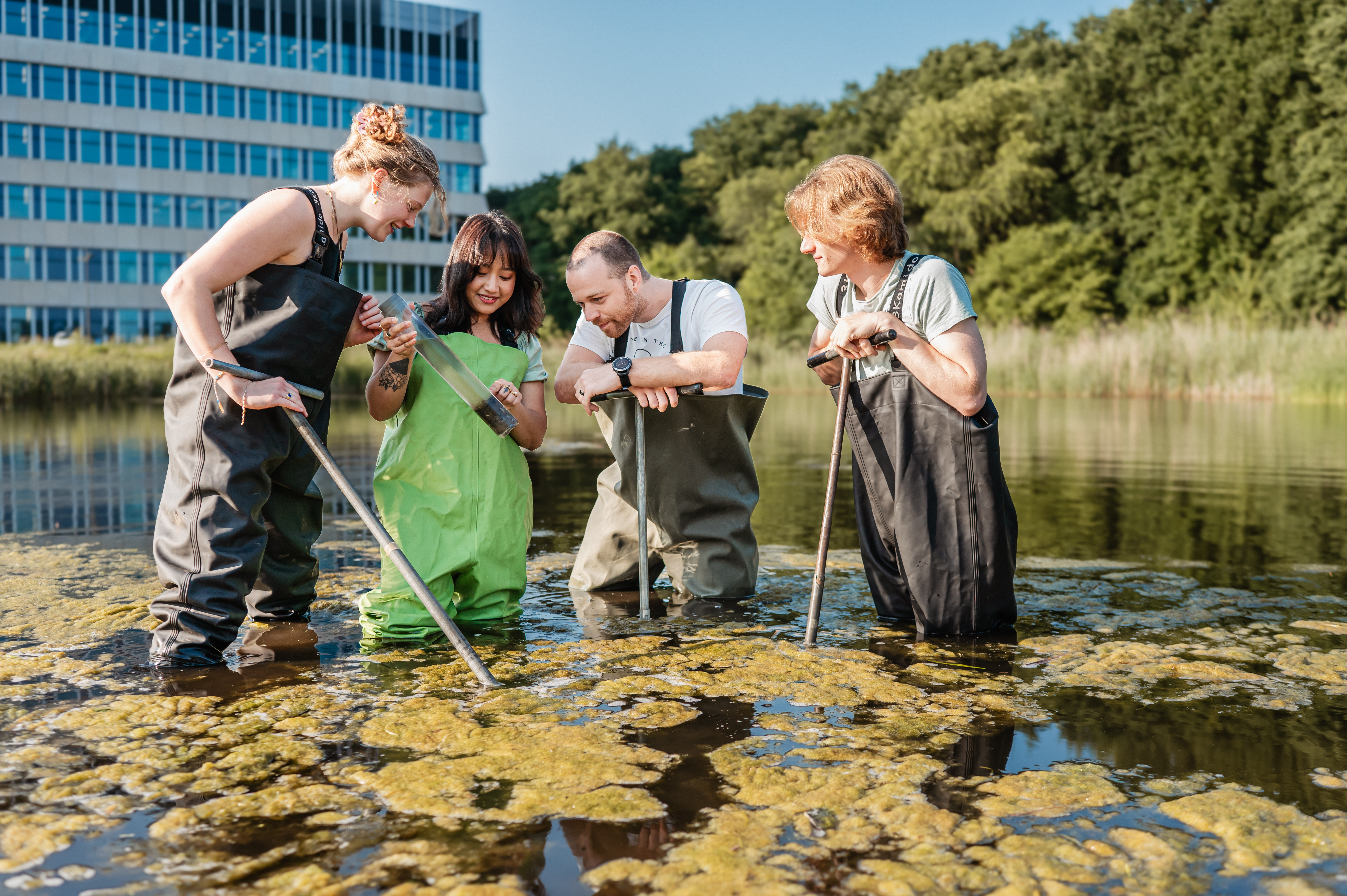 students in the lake on campus