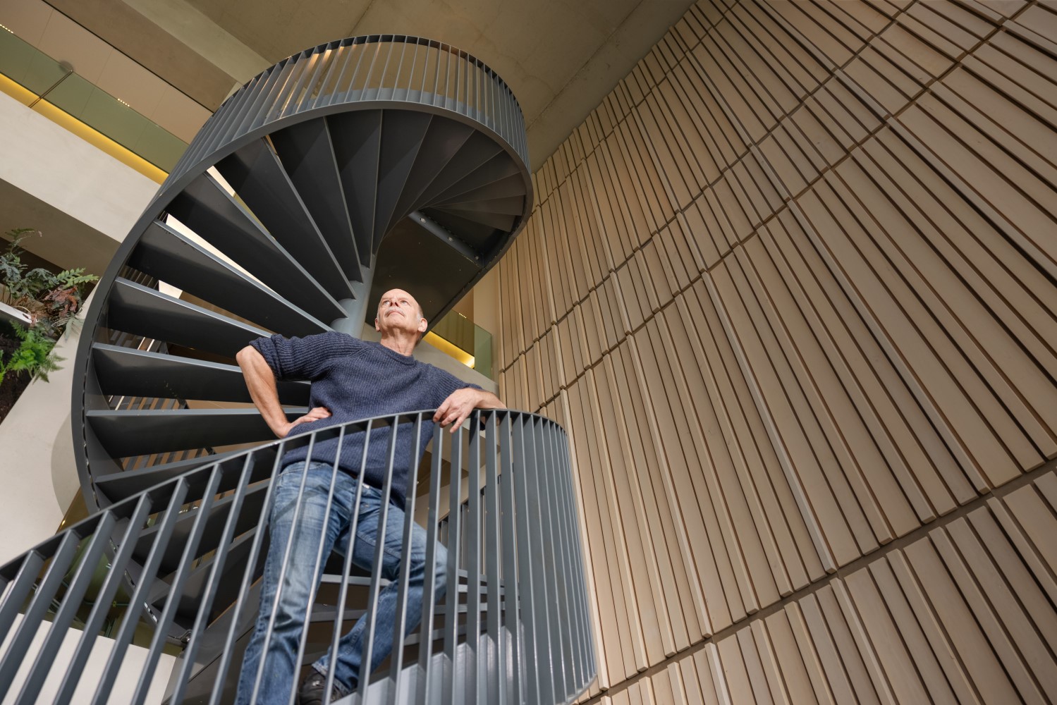 John standing on stairs