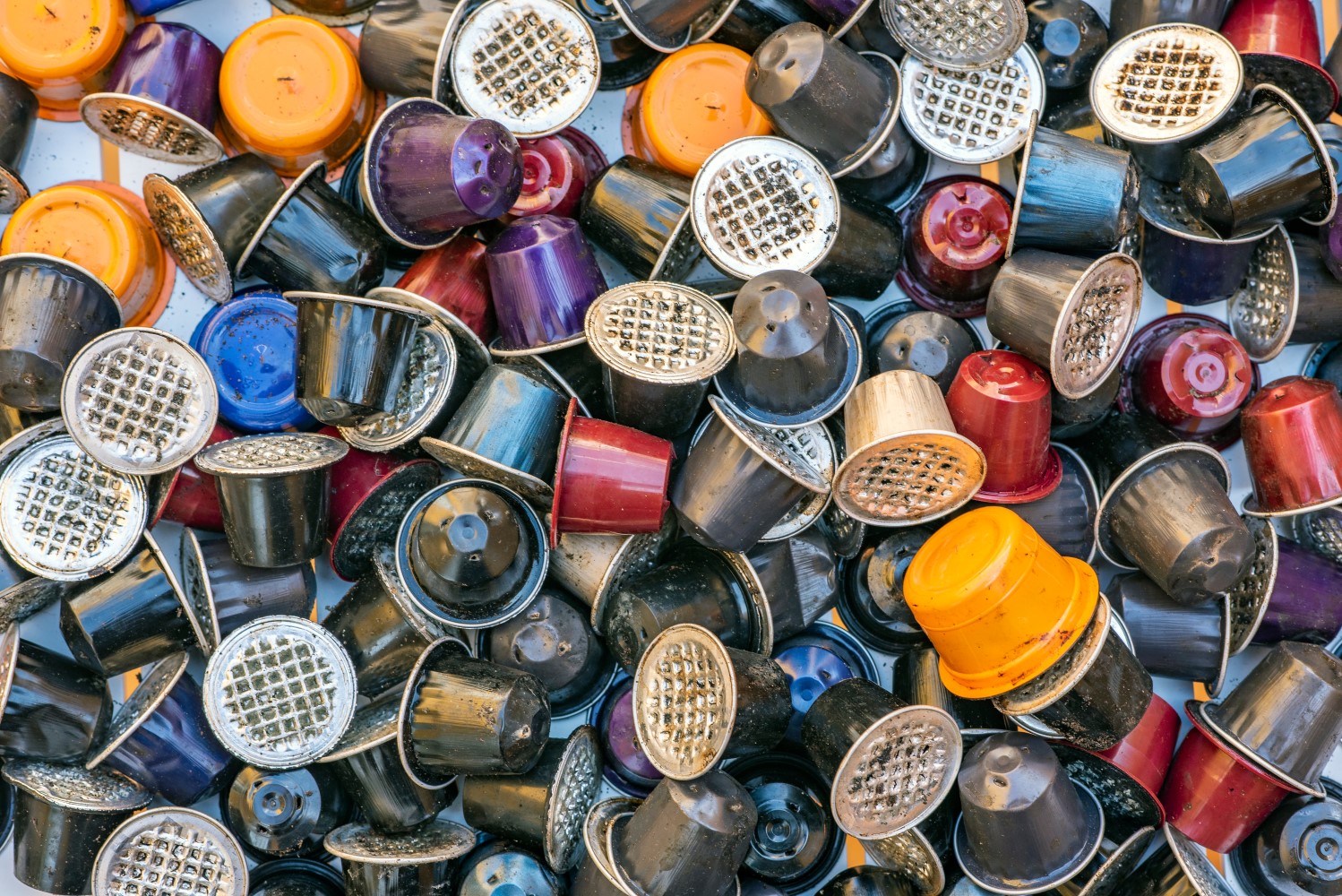 Pile of used coffee capsules