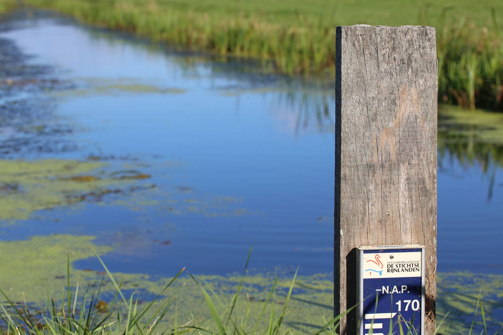 N.A.P. measuring sign in a canal