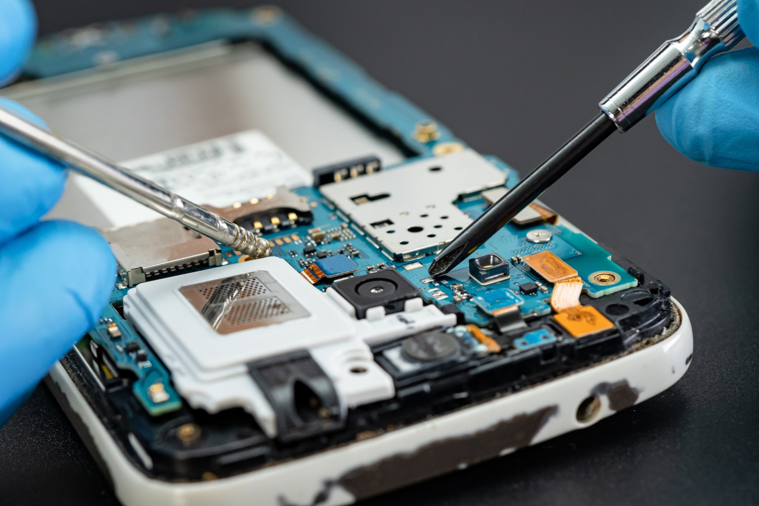 Inside of a telephone is being repaired