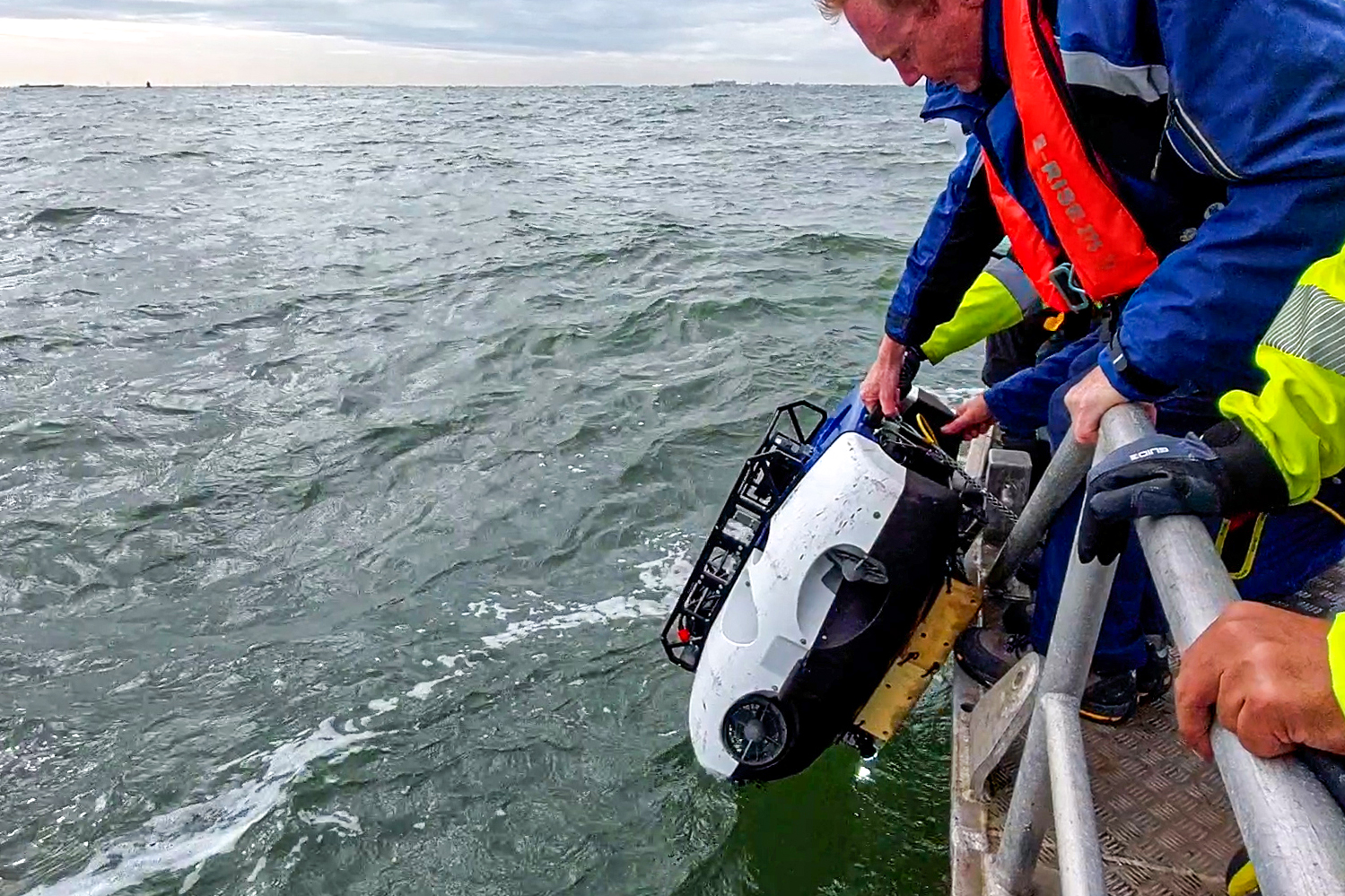 Drone being placed in water