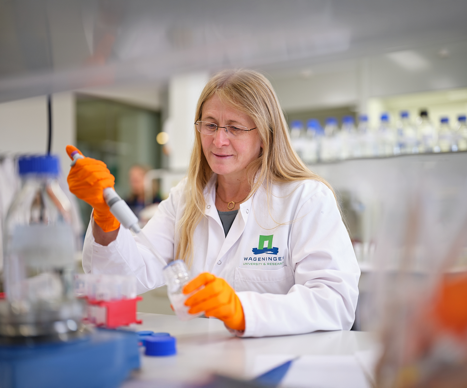 researcher in food safety lab