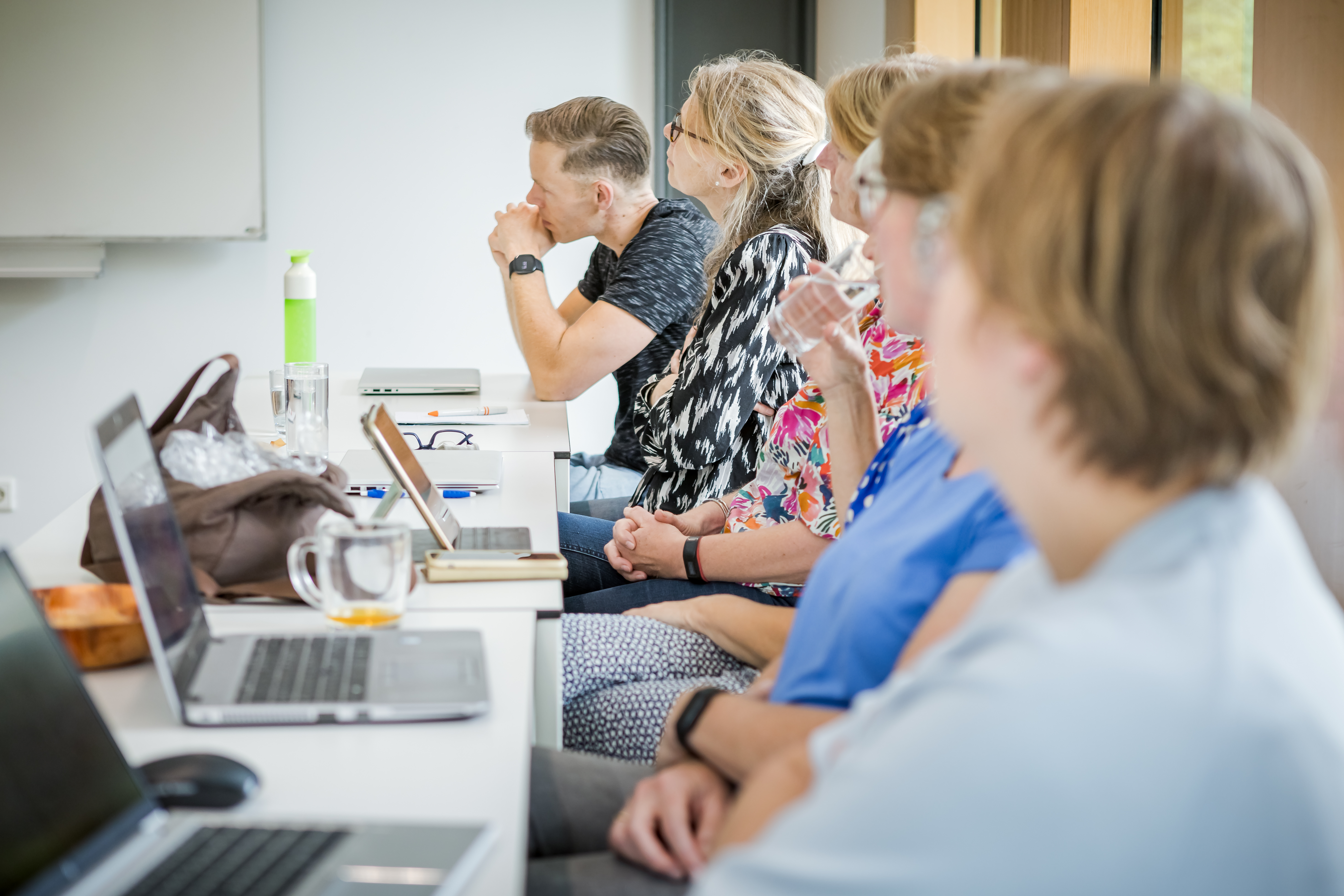 Participants listening carefully during a training course