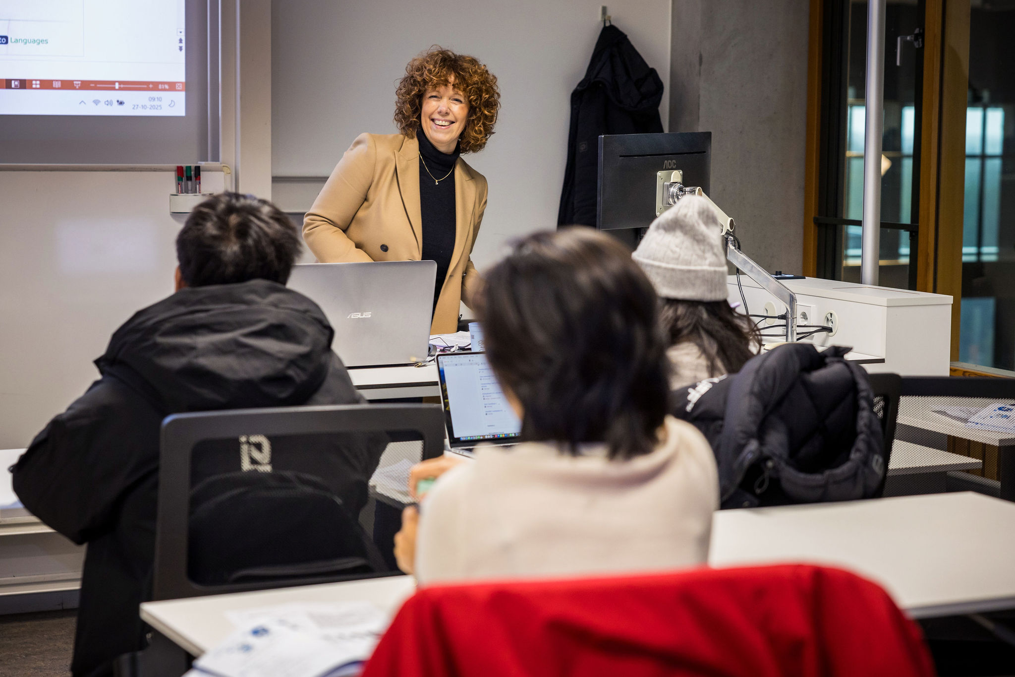 Teacher in a classroom during a seminar