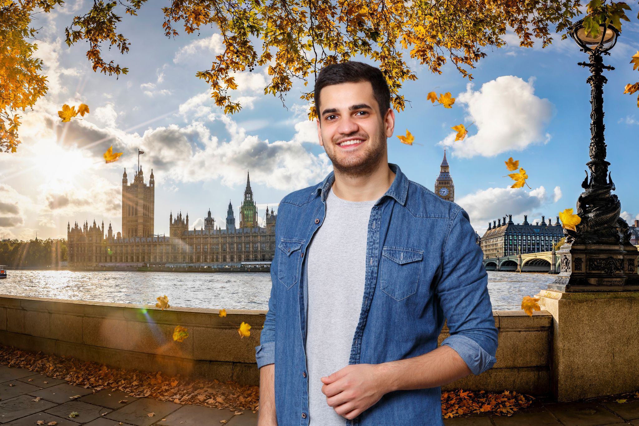 Man poses in front of cityscape in London