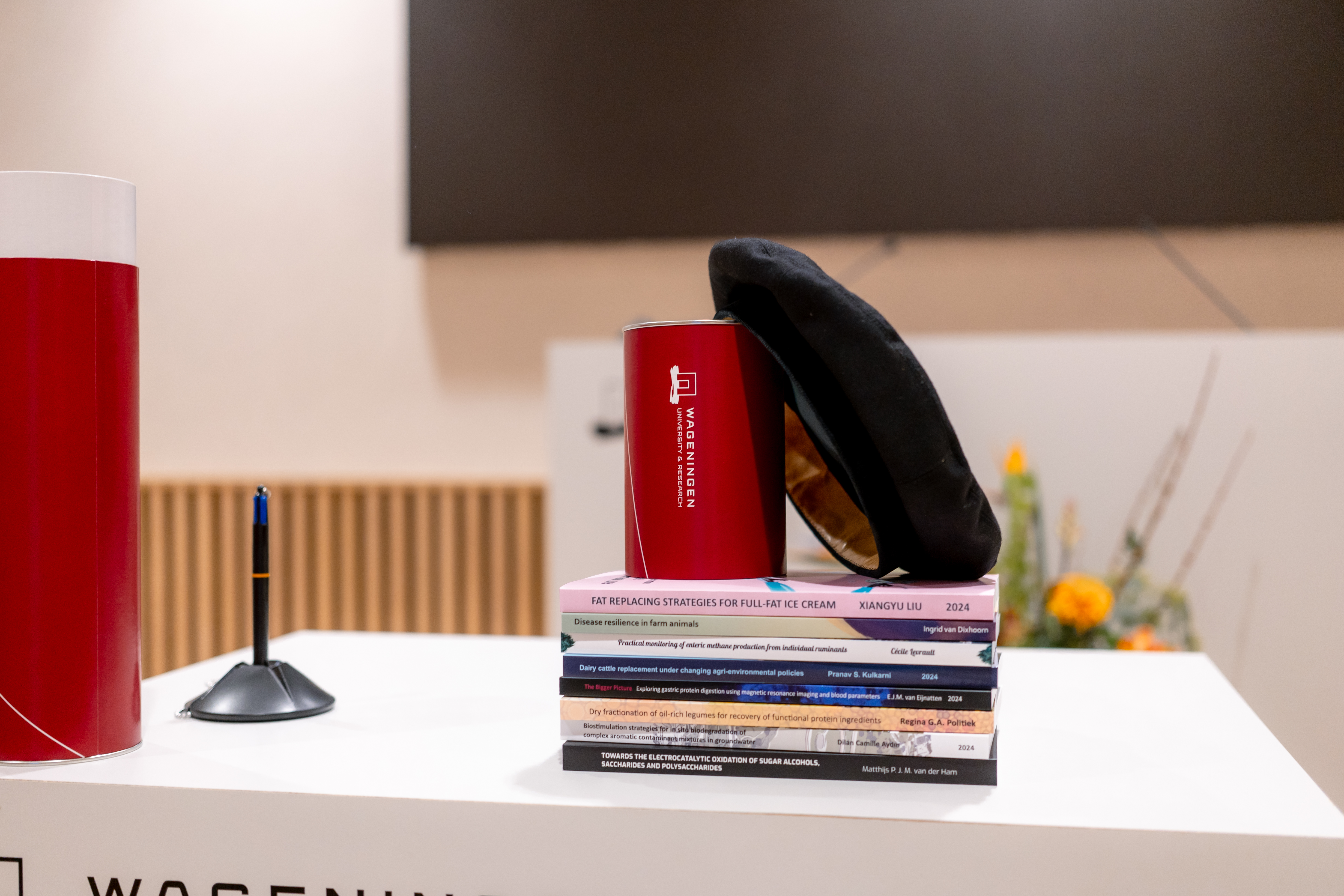 Stage auditorium with objects for a PhD defence ceremony