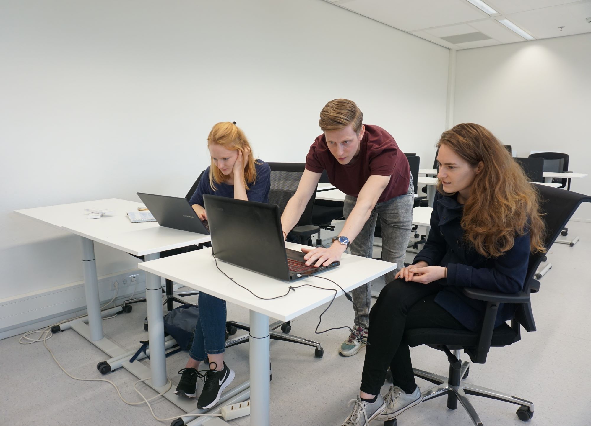 Students of Animal Breeding and Genomics sitting in a classroom with a teacher