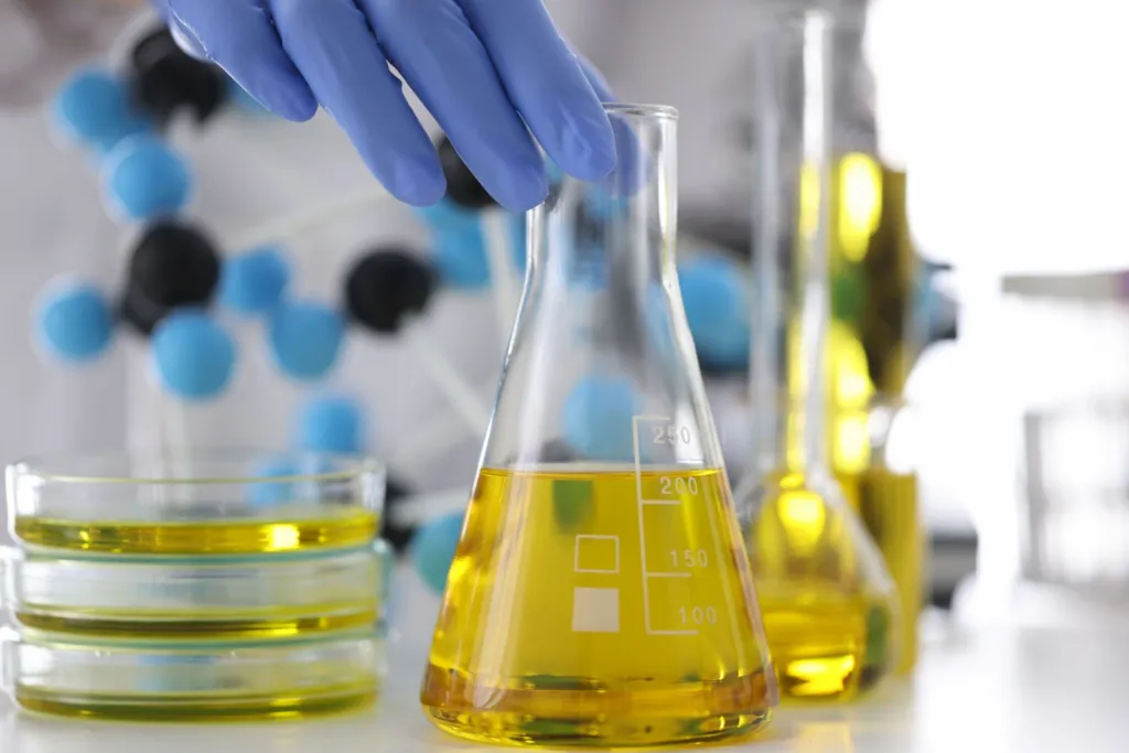  Yellow liquid in chemical laboratory closeup