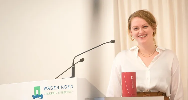 Berber Dorhout having a speech at WUR