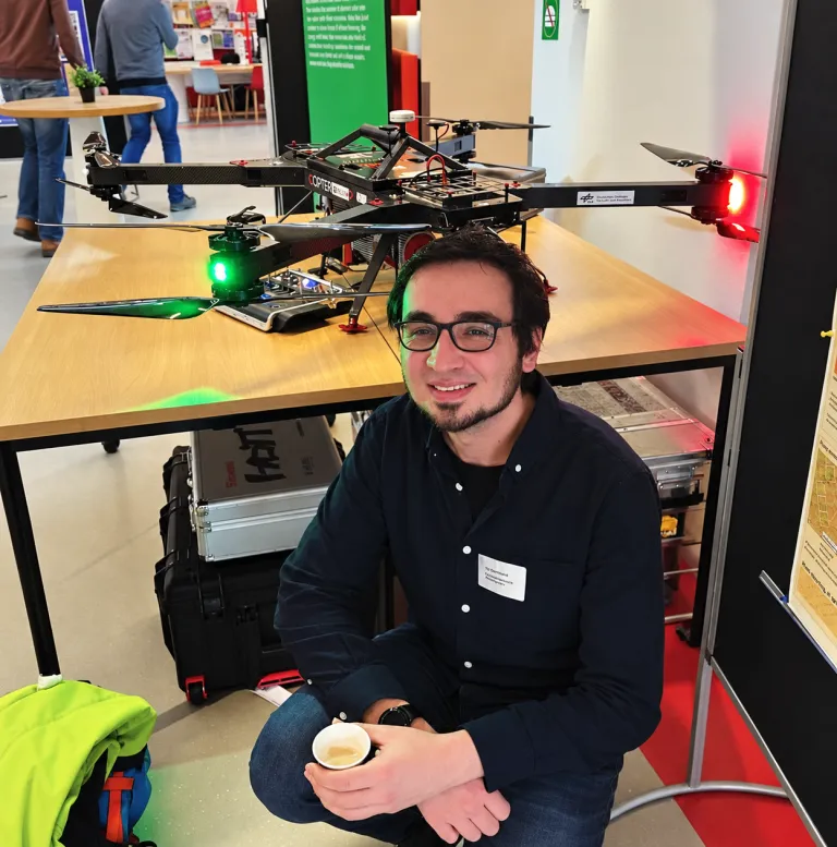 man in front of drone tech phenotyping