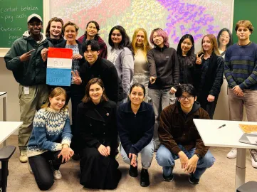 Group photo of participants and teacher Social Dutch course